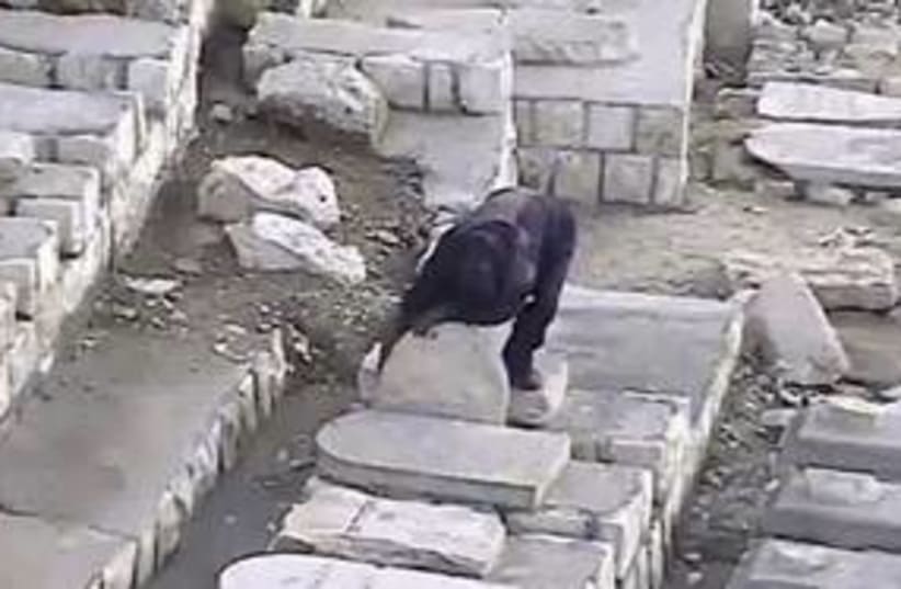 Vandalism at the Mount of Olives 311 (photo credit: Video obtained by the International Committee for )