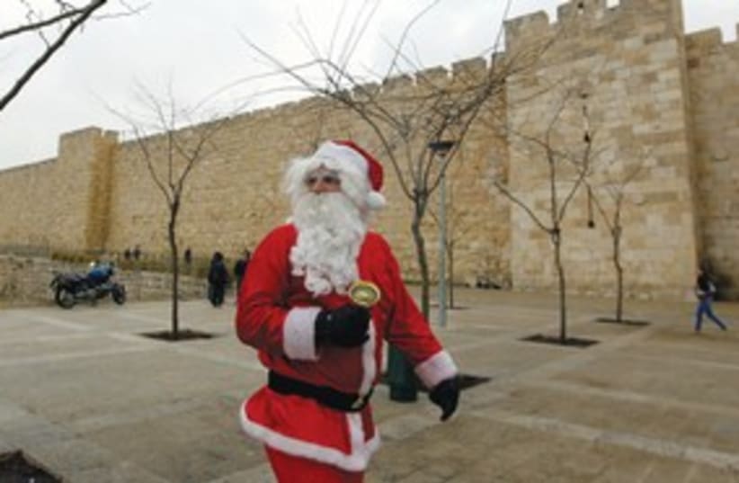 Santa Clause in Jerusalem (photo credit: (Ammar Awad/Reuters))