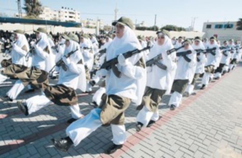 Female Hamas security forces graduation 311 (R) (photo credit: Ismail Zaydah/Reuters)