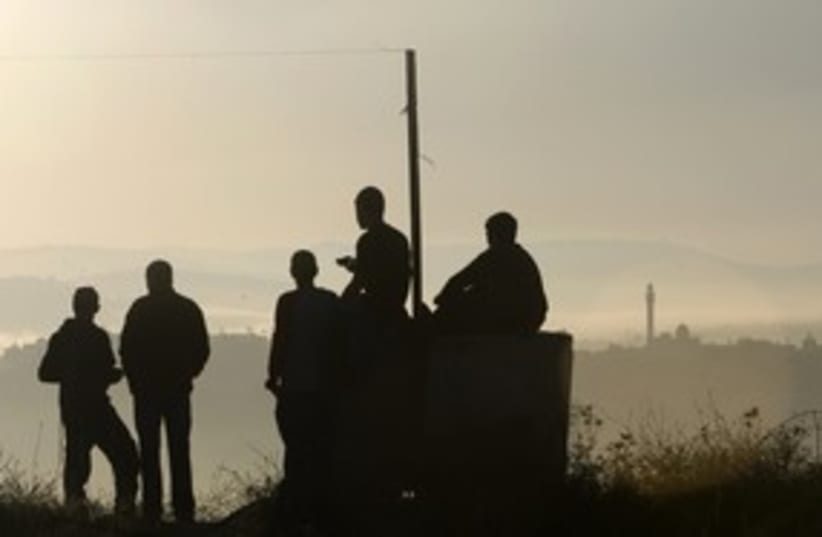 Settlers gather for prayer in Ramat Gilad_311 (photo credit: REUTERS/Ronen Zvulun)