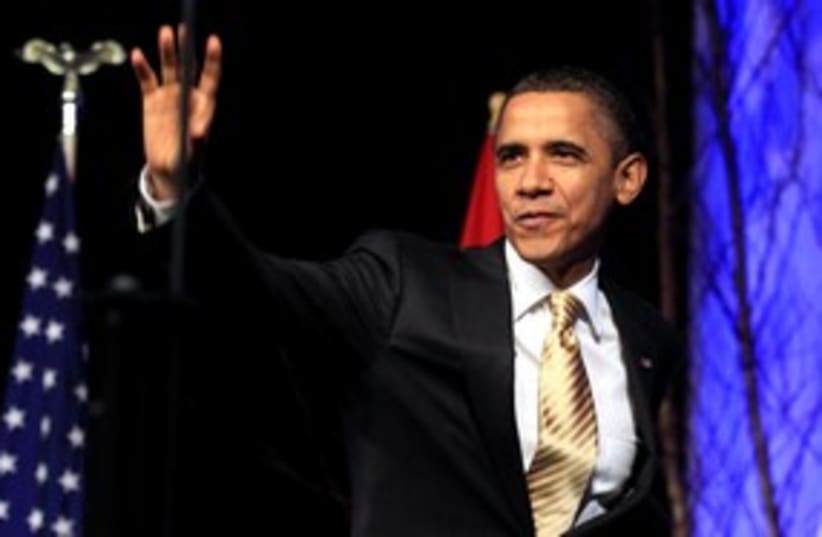 US President Barack Obama smile 311 (R) (photo credit: REUTERS/Kevin Lamarque)