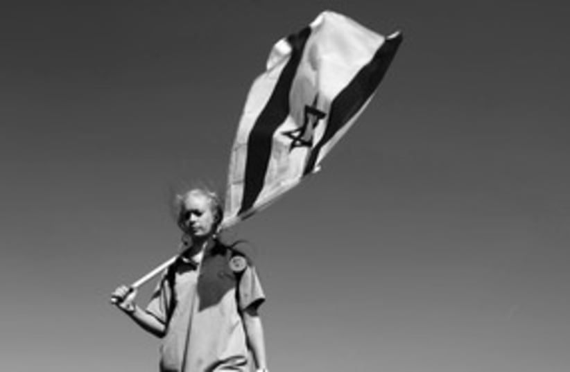Jewish girl with Israeli flag (black and white) 311 (photo credit: (Ariel Jerozolimski))
