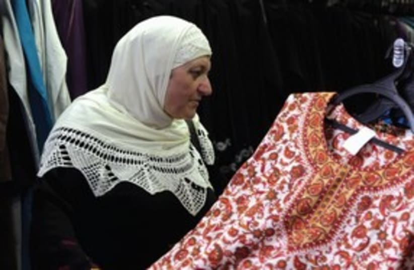Palestinian Arab woman shopping store 311 (photo credit: Marc Israel Sellem)