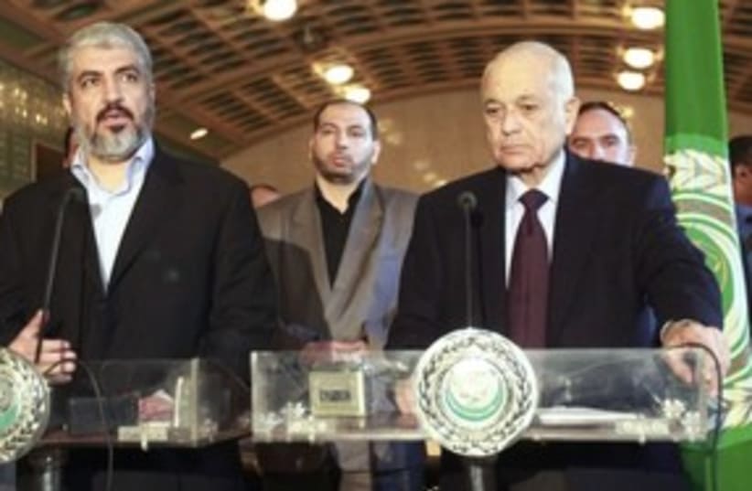 Hamas leader Mashaal (L), Arab League chief Elaraby (R)_311 (photo credit: Reuters)