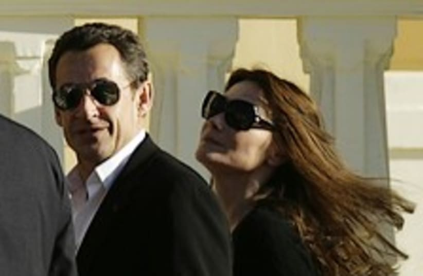 Sarkozy and bird 224.88 (photo credit: AP)