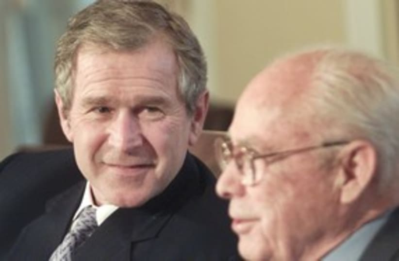 Bob Strauss and George W. Bush 311 (photo credit: Reuters)