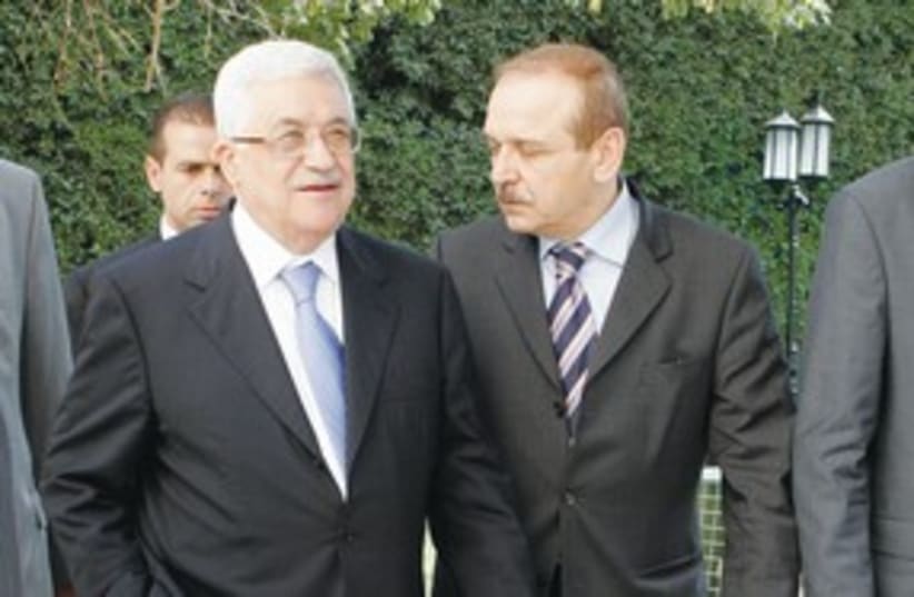 Mahmoud Abbas and Yasser Abed Rabbo 311 (R) (photo credit: Nasser Nuri/Reuters)