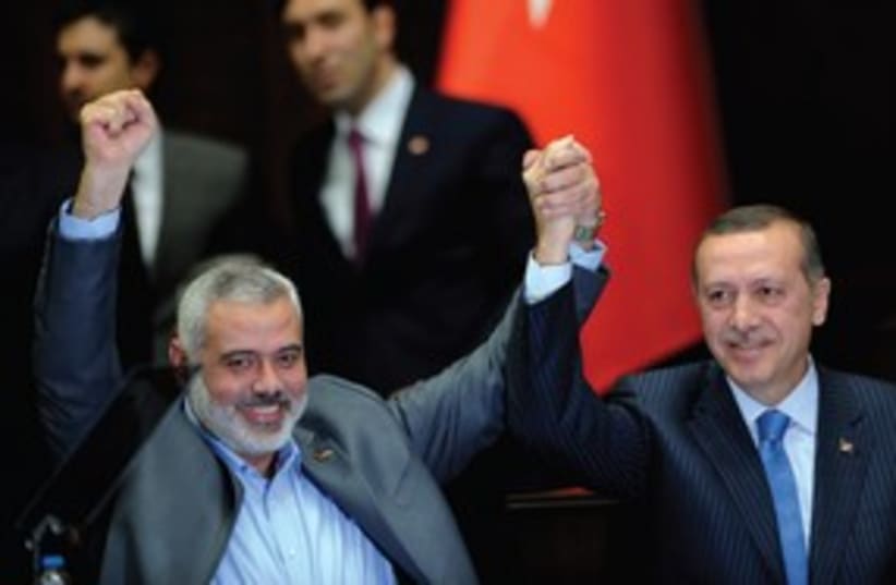 PRIME MINISTER Erdogan and Hamas leader Haniyeh 311 (photo credit: Reuters)