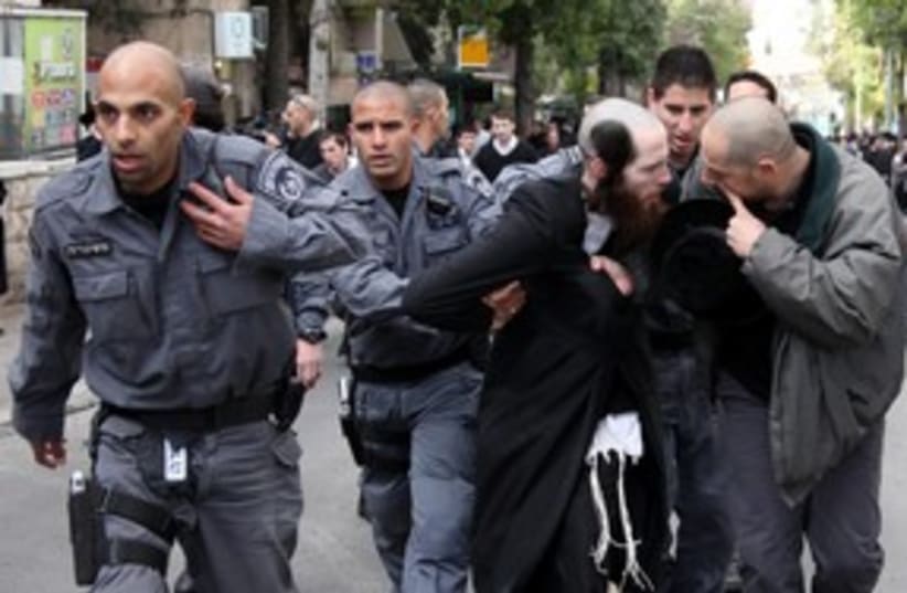 Haredi man arrested in Mea Shearim 311 (photo credit: Marc Israel Sellem)