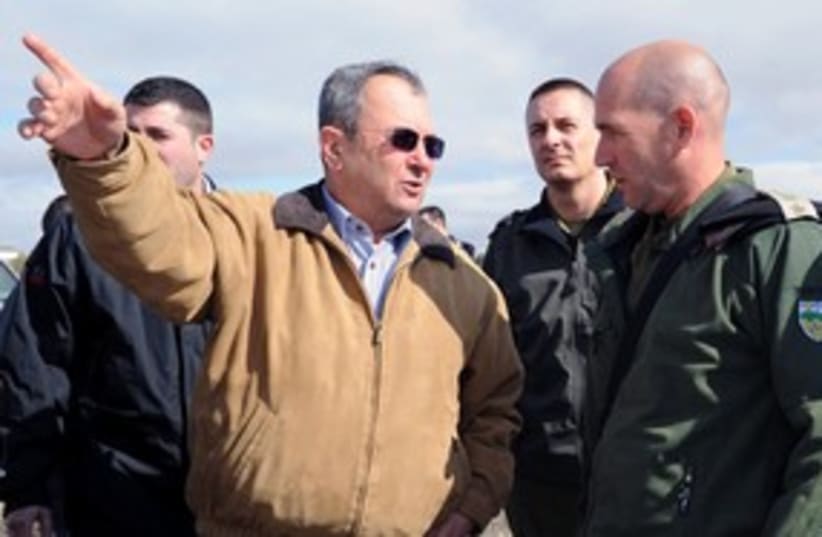 Defense minister Ehud Barak pointing 311 (photo credit: Ariel Harmoni/Defense Ministry)