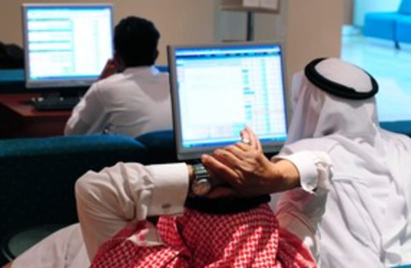 Saudi traders stocks 311 (photo credit: STR New / Reuters)
