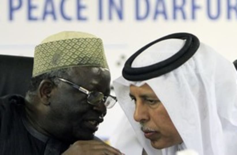 Ibrahim Gambari and Qatars Ahmed Mahmoud  311 R (photo credit: Mohamed Nureldin Abdallah / Reuters)
