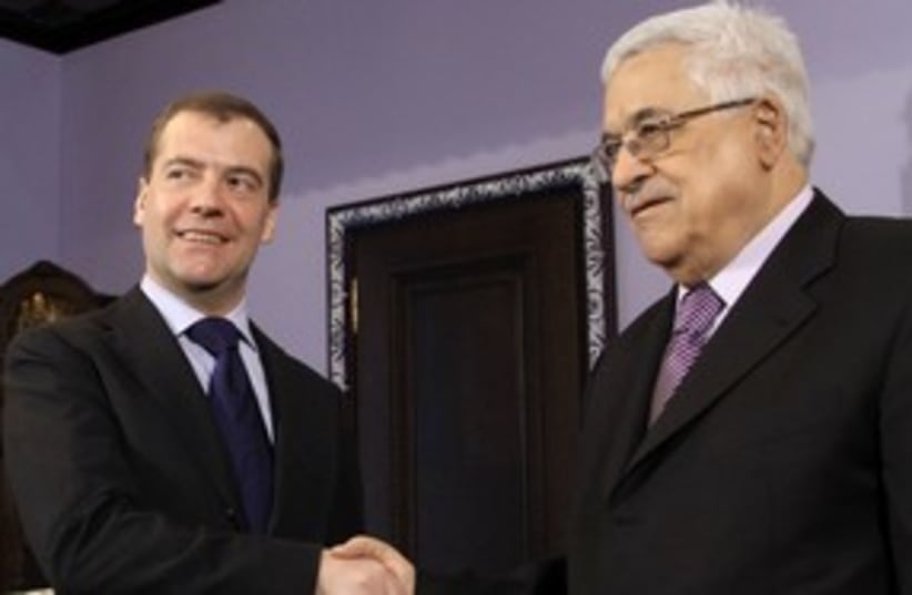Abbas and Medvedev 311 (photo credit: REUTERS)