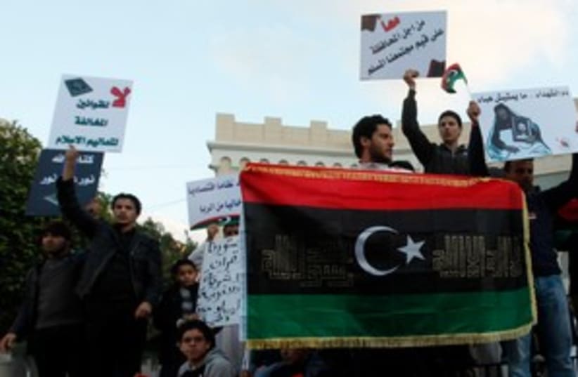 Libyan Muslims rally in support of sharia law 311 (R) (photo credit: REUTERS/Ismail Zitouny)