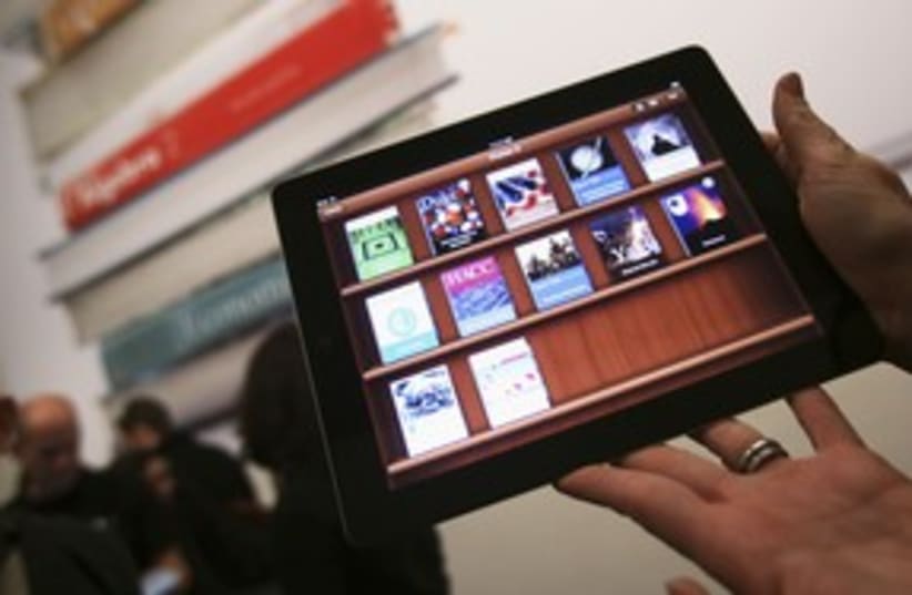 An educational application on an iPad 311 (R) (photo credit: Shannon Stapleton / Reuters)