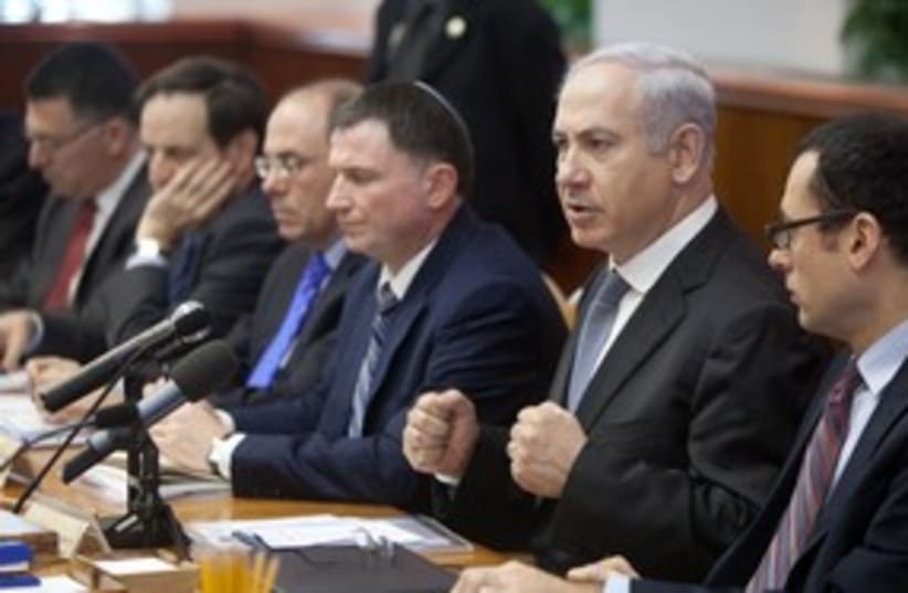 Prime Minister Binyamin Netanyahu pounding fists 311 (photo credit: Emil Salman / Pool / Haaretz)