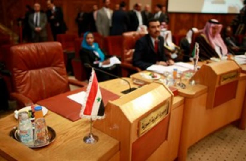 Syria's empty seat at the Arab League 311 (R) (photo credit: REUTERS/Suhaib Salem)