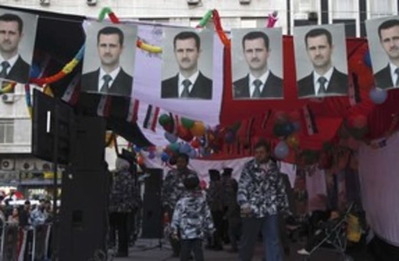 Assad flags, Damascus_311 (photo credit: Reuters)