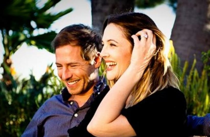 Drew Barrymore with fiancé Will Kopelman 390 (photo credit: REUTERS/Flower Films/Handout)