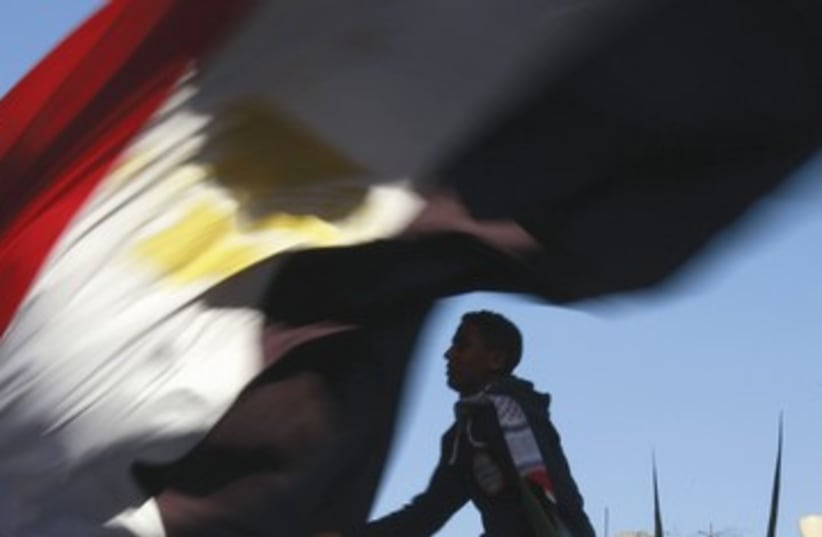 First anniversary of Egypt’s uprising in Tahrir Square 390 (photo credit: REUTERS)