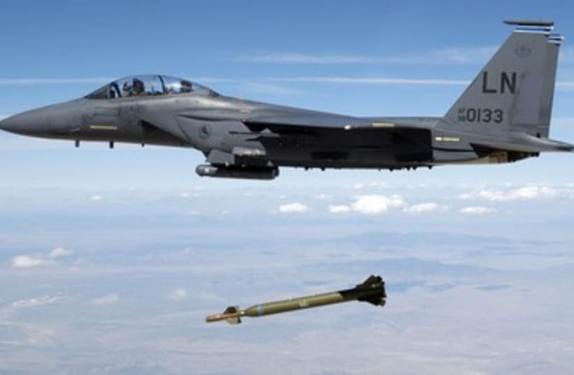 US Air Force F-15E releases a GBU-28 "Bunker Buster" 390 (photo credit: REUTERS/Handout)