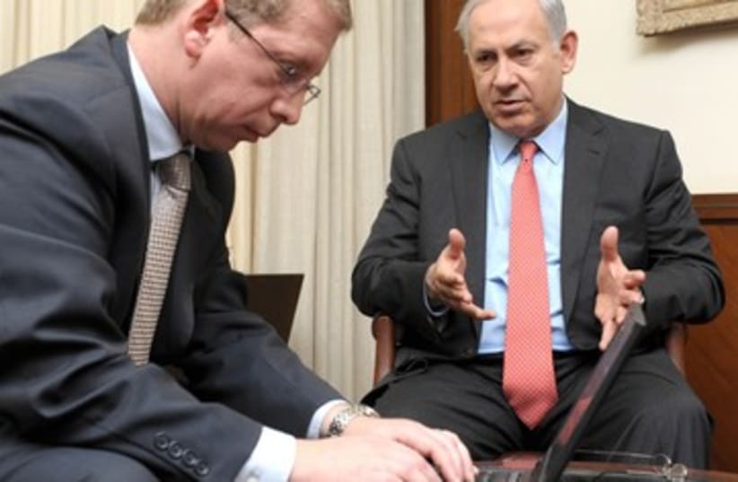 Prime Minister Binyamin Netanyahu with computer 390 (photo credit: Moshe Milner/GPO))