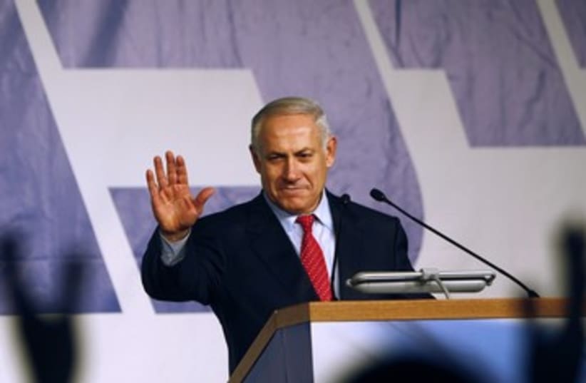 Netanyahu with likud background 390 (photo credit: REUTERS)