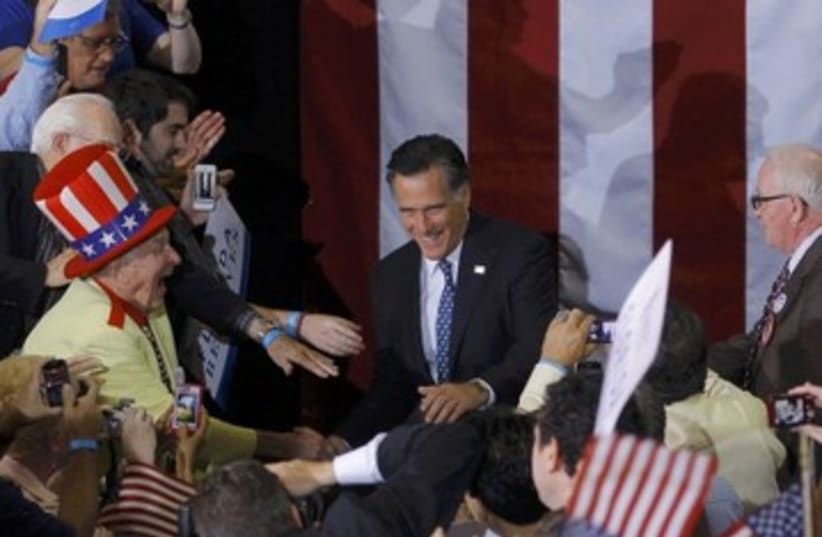 Romney with Florida supporters_390 (photo credit: Reuters)