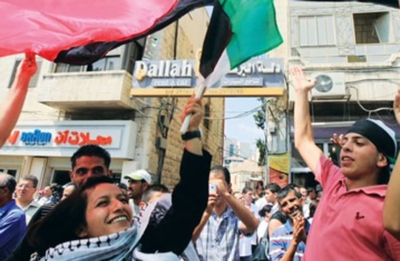 Palestinians celebrating fun joy 390 (photo credit: MARC ISRAEL SELLEM)
