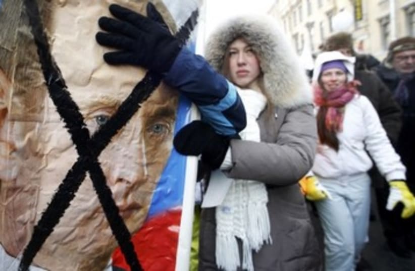 Russian protests against Putin_390 (photo credit: Alexander Damianchuk/Reuters)