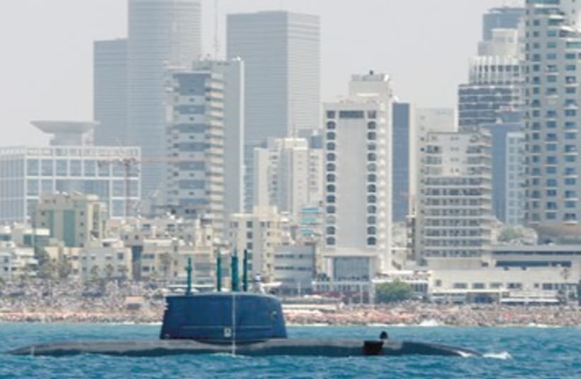 Israel Navy submarine sails off Tel Aviv 390 (photo credit: Baz Ratner/Reuters)