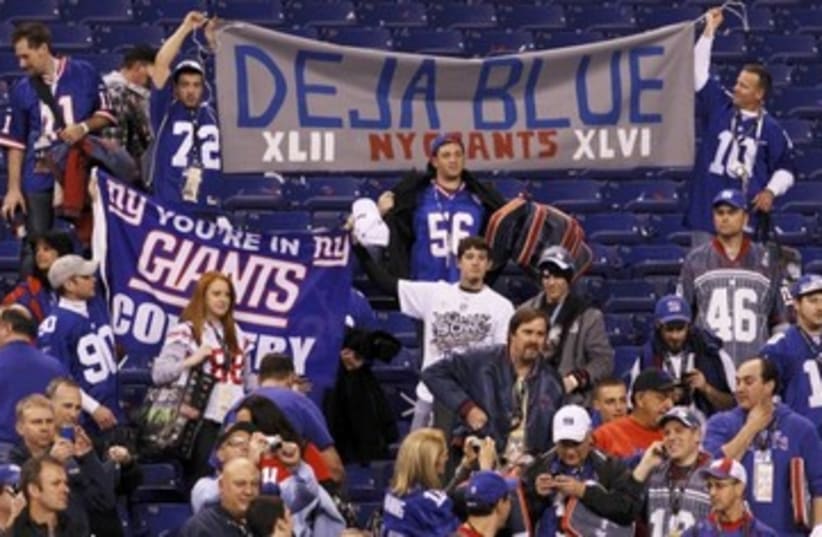 New York Giants fans celebrate Super Bowl win_390 (photo credit: Reuters)