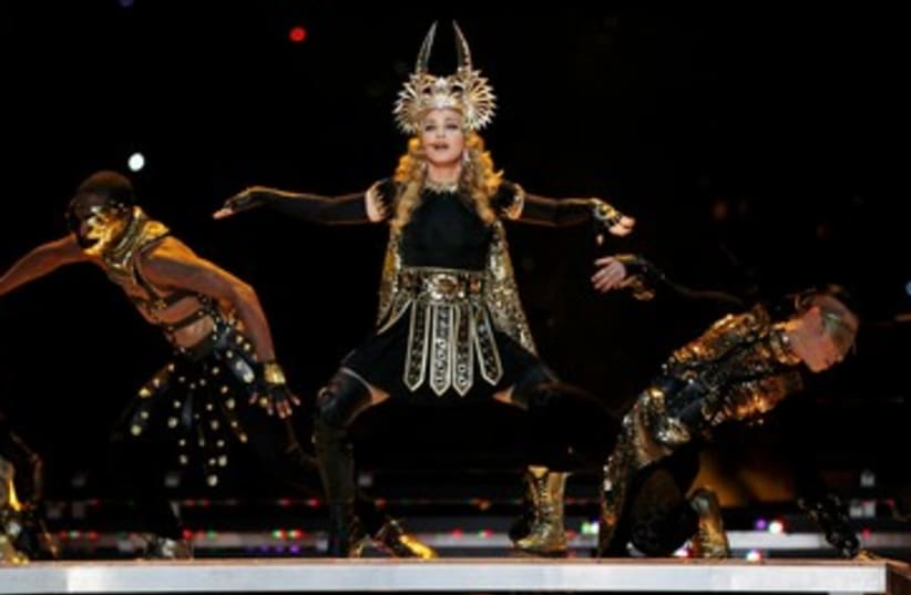 Madonna at superbowl 390 (photo credit: REUTERS/JEFF HAYNES)