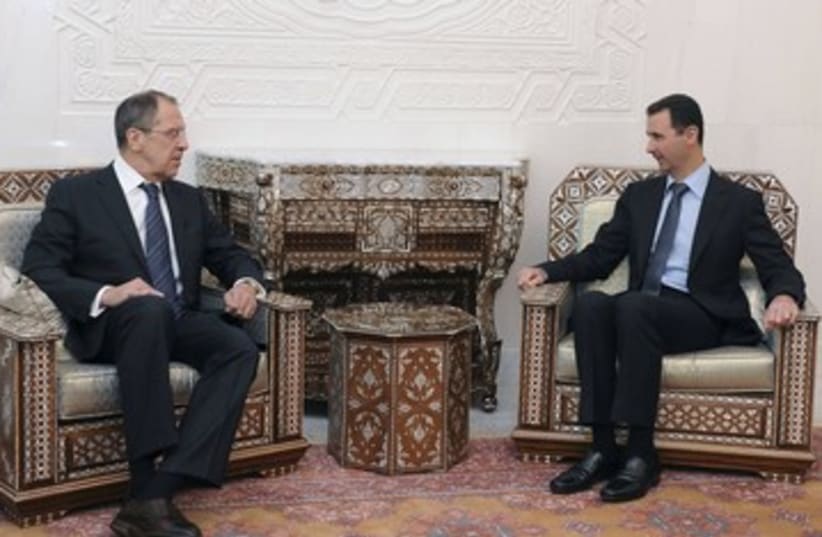 Syrian Pres. Assad, Russian FM Lavrov, Damascus_390 (photo credit: Reuters)