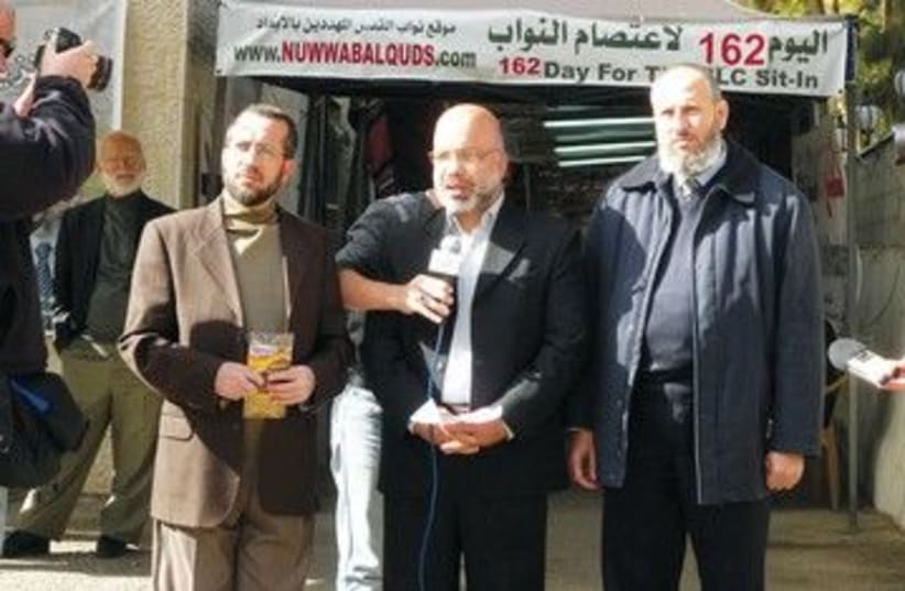 The Hamas members in front of J'lem Red Cross compound 390 (photo credit: Melanie Lidman)