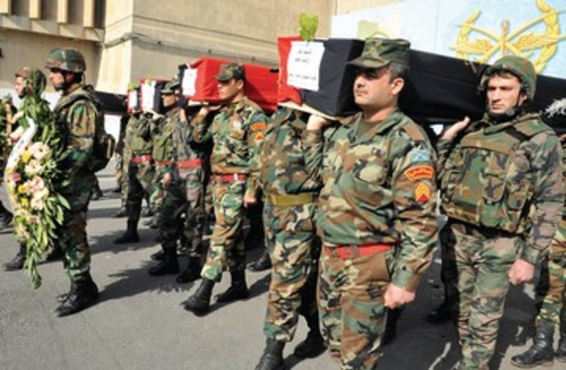 Syrian soldiers funeral 390 (photo credit: REUTERS)