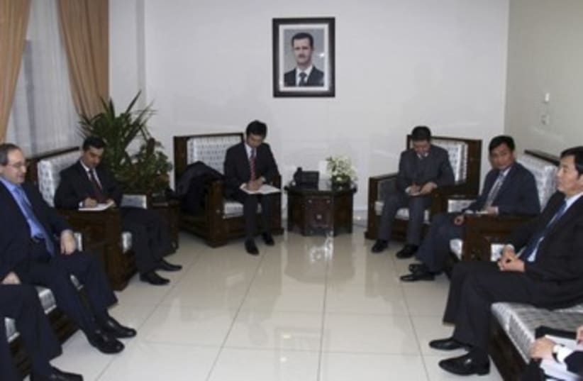 Chinese diplomats in Damascus_390 (photo credit: Reuters)
