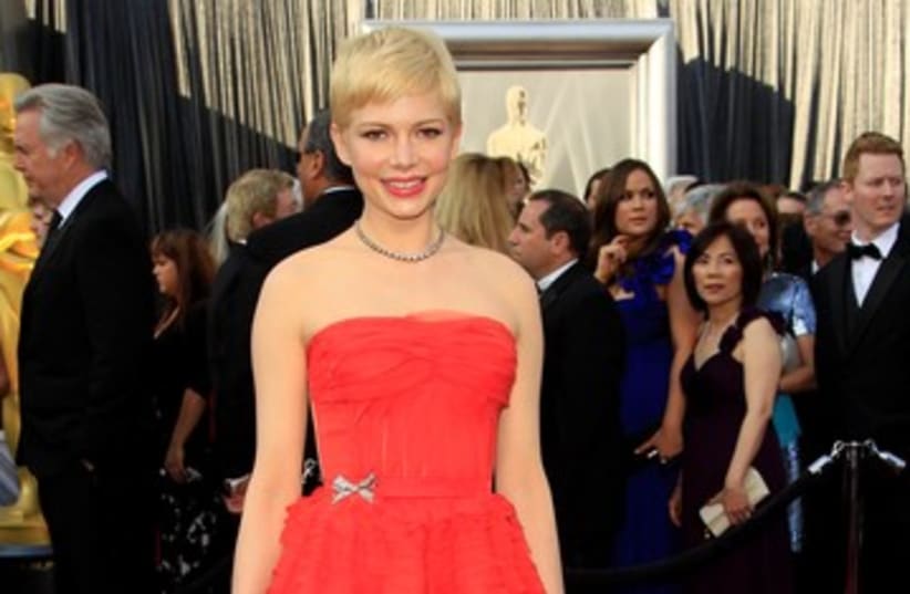 Michelle Williams arrives at the Oscars 390 (photo credit: REUTERS)