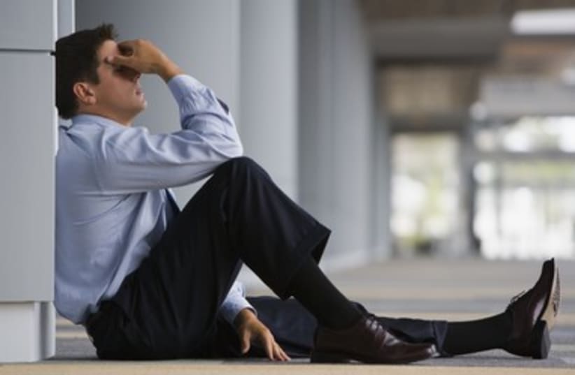 Overwhelmed anxious businessman 390 (photo credit: Thinkstock/Imagebank)