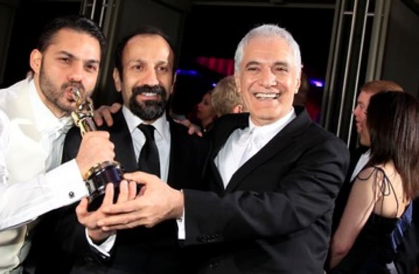 'A Separation' director Asghar Farhadi (C) 390 (R) (photo credit: REUTERS/Lucy Nicholson)