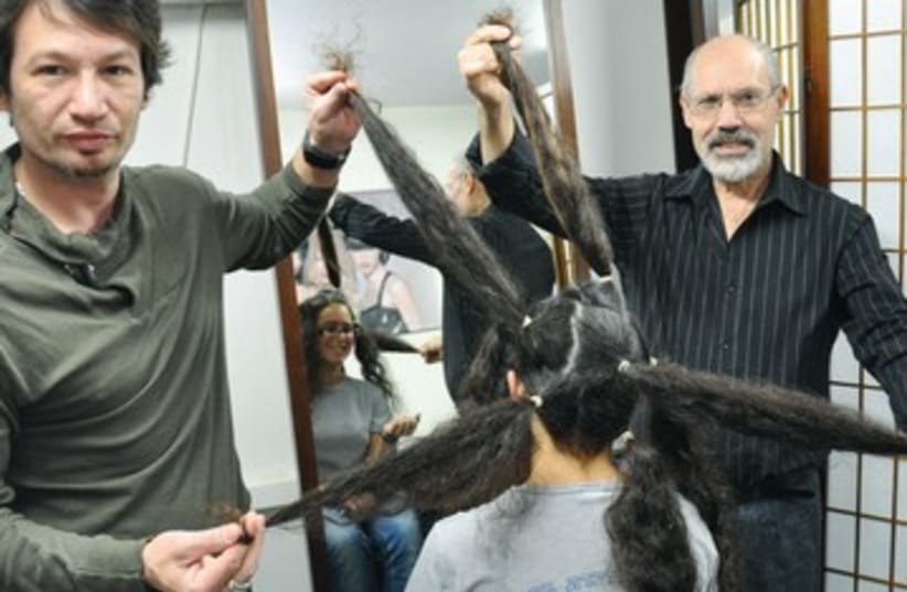 LIRON POLLACK donates hair haircut 390 (photo credit: Courtesy Kaplan Medical Center)