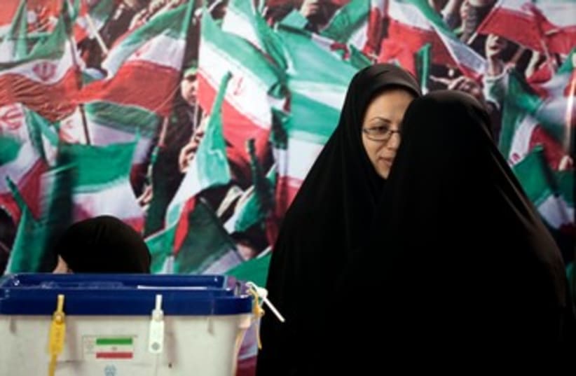 Iran election officials polls ballots 390 (photo credit: REUTERS/Morteza Nikoubazl )