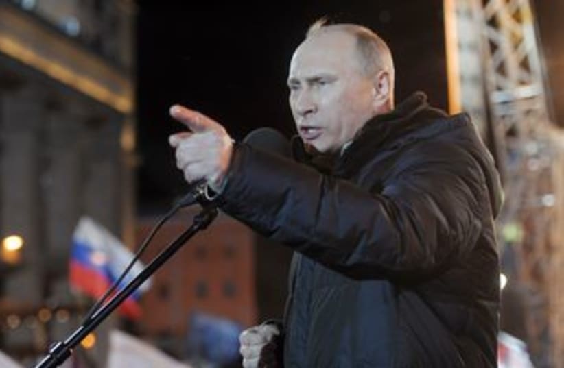 Vladimir Putin addresses supporters 390 (R) (photo credit: REUTERS/Aleksey Nikolskyi/RIA Novosti/Pool)