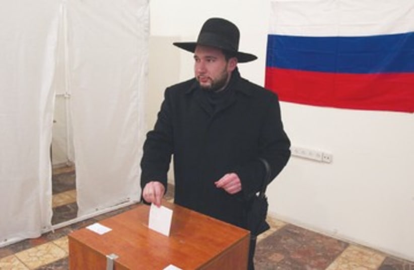  NATAN SHUSTIN, a Moscow native, casts his ballot 390 (photo credit:  NATAN SHUSTIN, a Moscow native, casts his ballot)