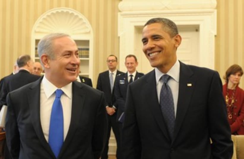 Obama Netanyahu smiling happy meeting 390 (photo credit: Amos Ben Gershom / GPO)