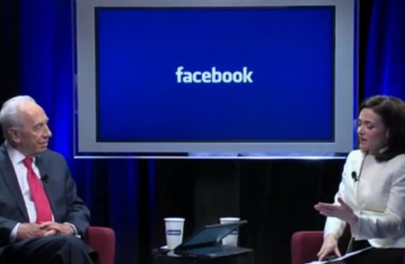 President Shimon Peres in Facebook interview 390 (photo credit: Screenshot)