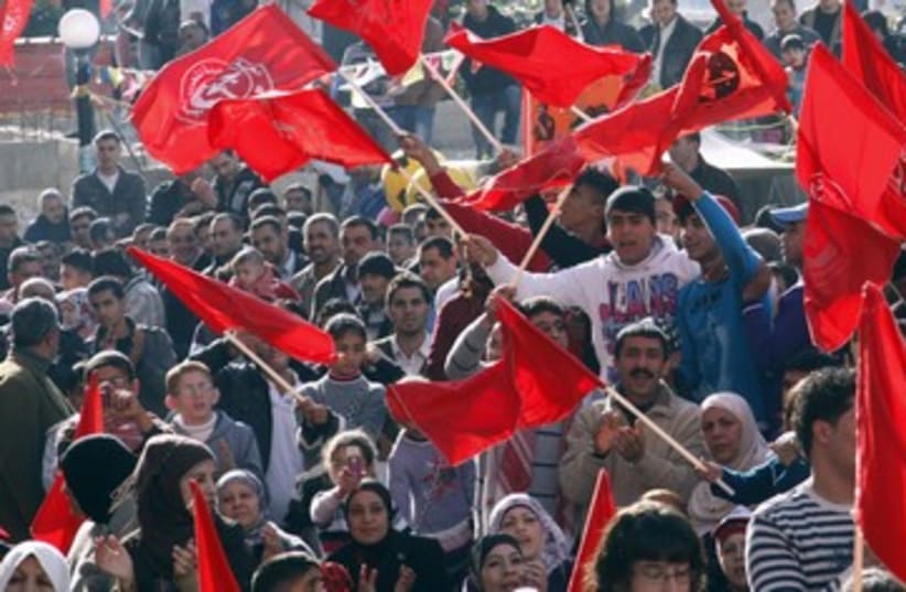 Palestinains rally for the PFLP 390 (photo credit: REUTERS/Abed Omar Qusini)