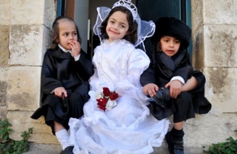 Haredi kids in Purim costumes (photo credit: Hadas Parush)