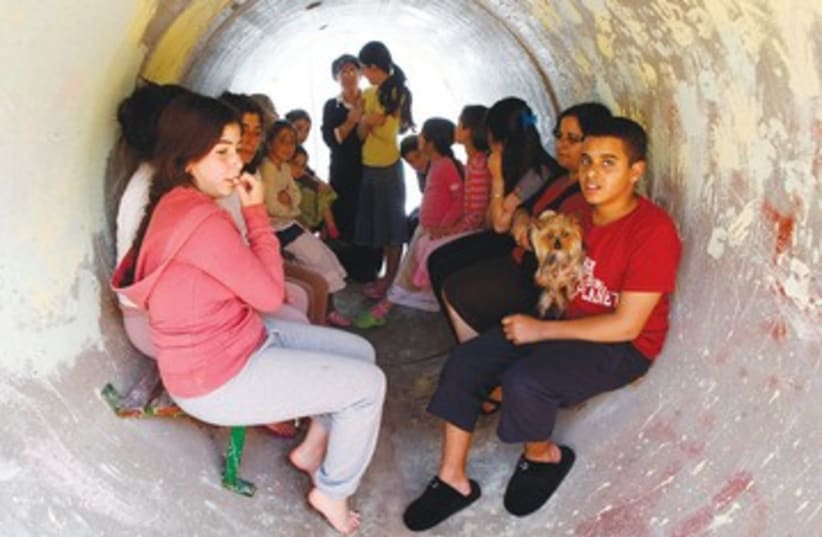 Nitzana residents seek refuge in sewage pipe 390  (photo credit: REUTERS)