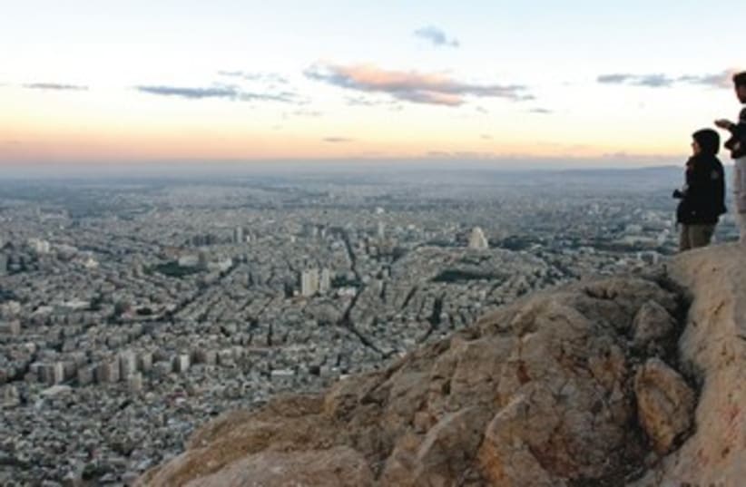 View of Damascus from Mt. Qassyoun  (photo credit: Reuters)